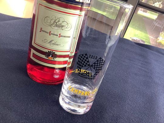 A Vintage Campari Longdrink Glass With Inscription Of The 24H Race Francorchamps, & Yellow Advertisement