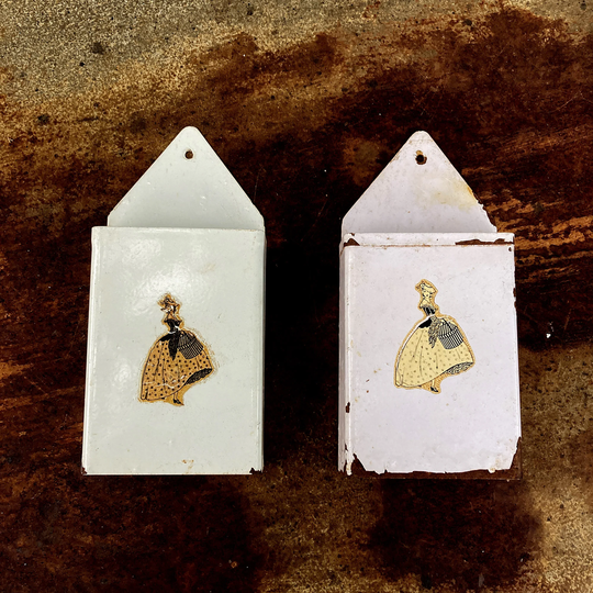 2 X Enamel Vintage Pose Pot Wall Hangs, Some Age Wear But With Figurine Motif Print