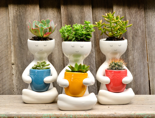 Modern White Ceramic Person With Pot Dual Planter