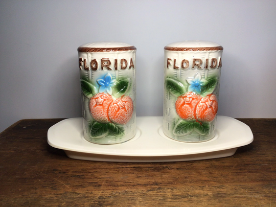 Hand Painted Florida Souvenir Salt & Pepper Shakers With Plate. Made in Japan. Great Condition. Bright Colors. Embossed Surface