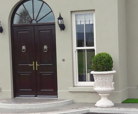 Pair Of Stone Vineyard Urns