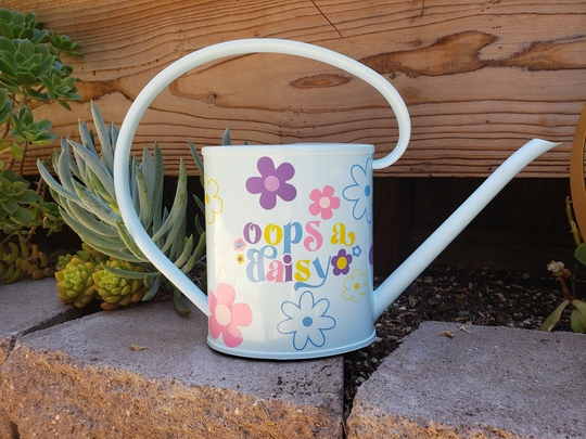 Light Blue Watering Can With Flowers & Cute Saying "Oops A Daisy