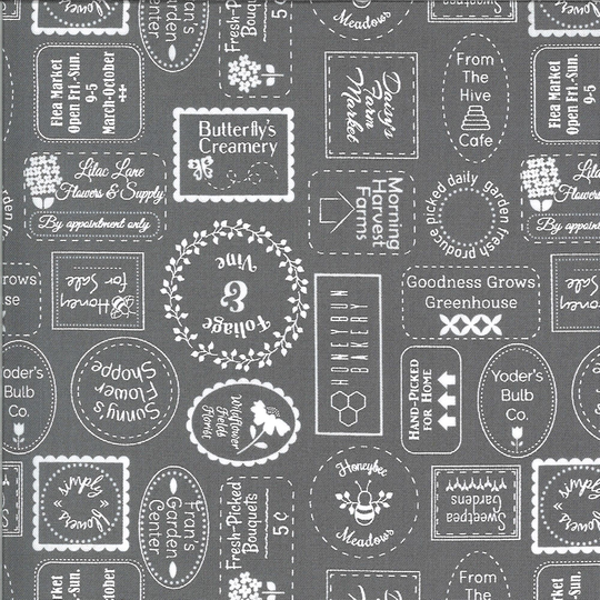 Moda Slate Seed Catalogue From Spring Brook By Corey Yoder 2911523. Grey Background With Labels. 44 Inch Wide Premium Quilters Cotton