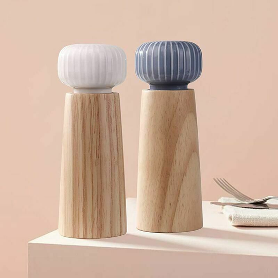 White and blue set of manual mill in simple wooden pepper sea salt pepper