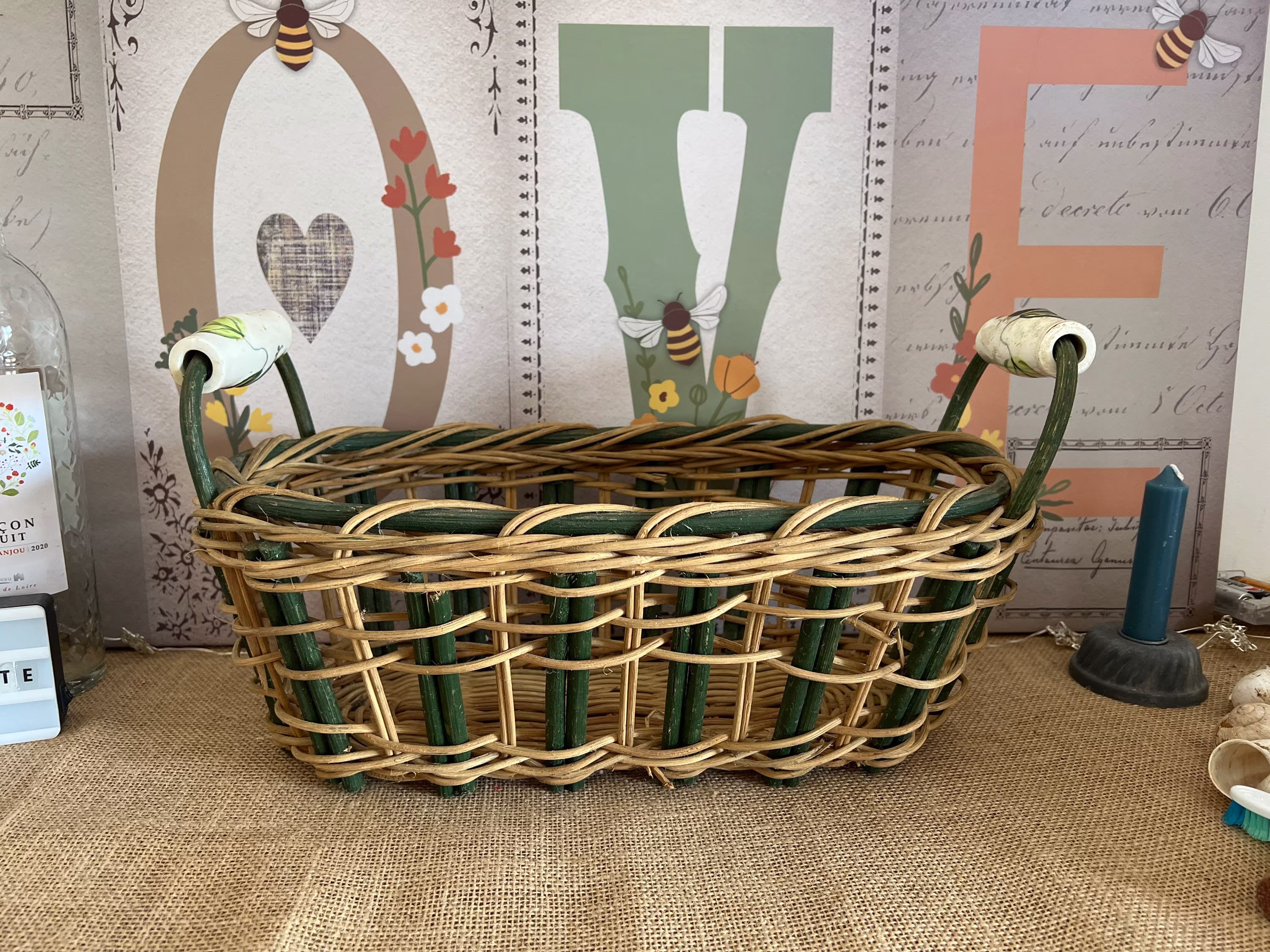 An Unusual Rustic Green & Natural Twine Rattan Planter Or Vegetable Basket With Hand Painted Water Melon China Handles
