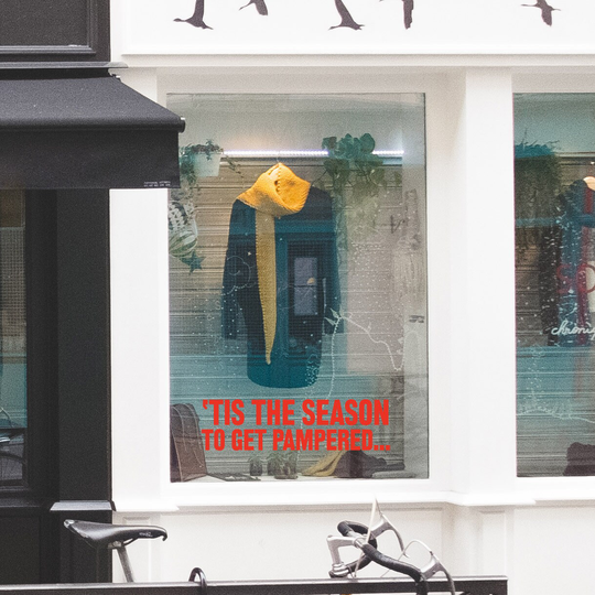 Tis The Season To Get Pampered Retail Window Vinyl. Festive Shop Graphics. Christmas Visual Merchandising Wall Sticker