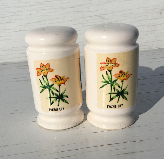 Saskatchewan Salt & Pepper Shakers - Features The Flag, Crest Flower. Prairie Lily Salt Pepper Shaker Set